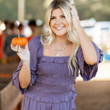 matching short set with ruffle trim on shorts and sleeves smock top pockets in shorts color plumb