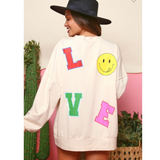 love graphic sweatshirt - pink peach boutique