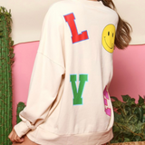 love graphic sweatshirt - pink peach boutique